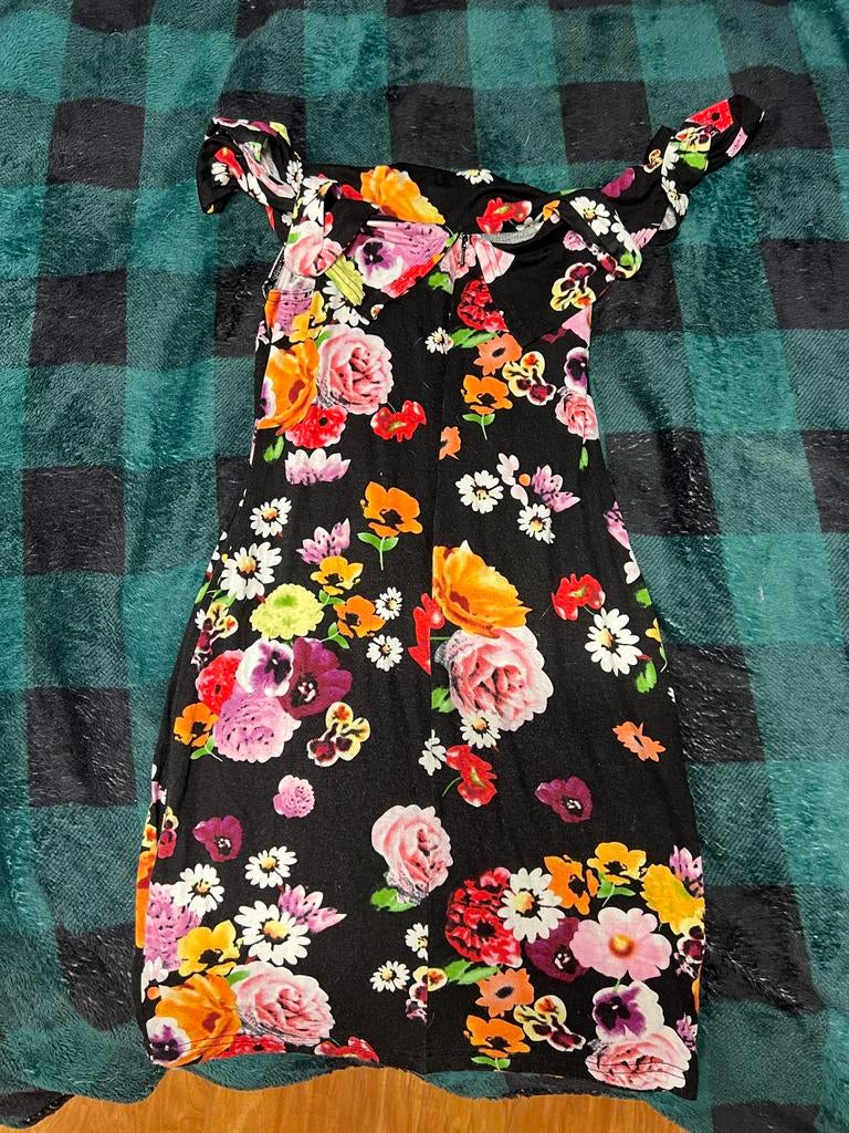 Zwart Kinderjurkje met Bloemen - Maat 140/146, Ophalen of Verzenden, Zo goed als nieuw