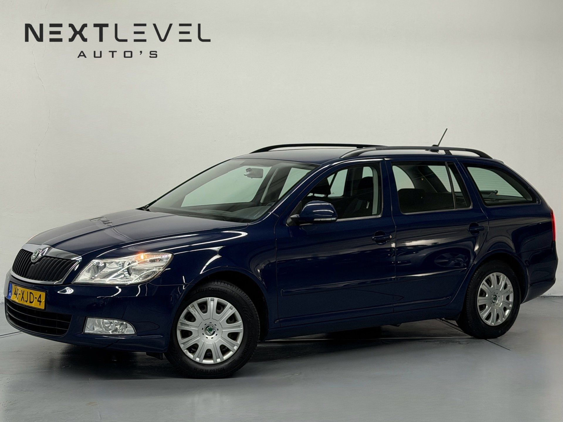 Skoda Octavia Combi 1.2 TSI Ambition Automaat New APK Vol On, Gebruikt, 4 cilinders, Blauw, Origineel Nederlands