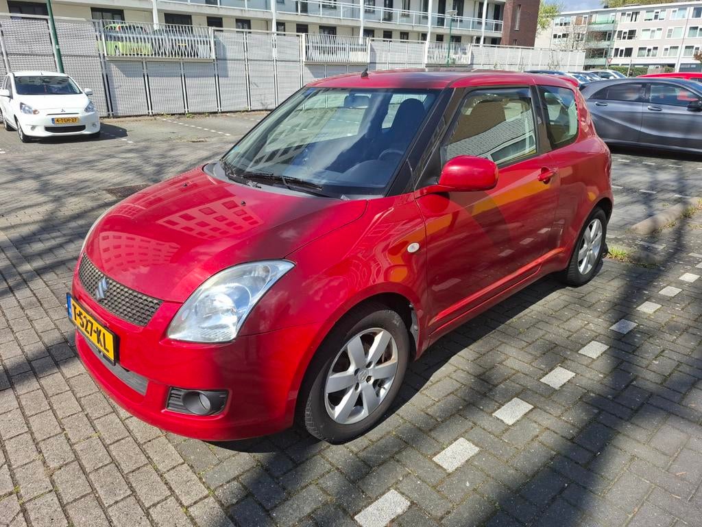 Suzuki Swift 1.3 3D 2009 Rood, met nieuwe APK!, Auto's, Suzuki, Stof, 31 €/maand, Swift, Handgeschakeld