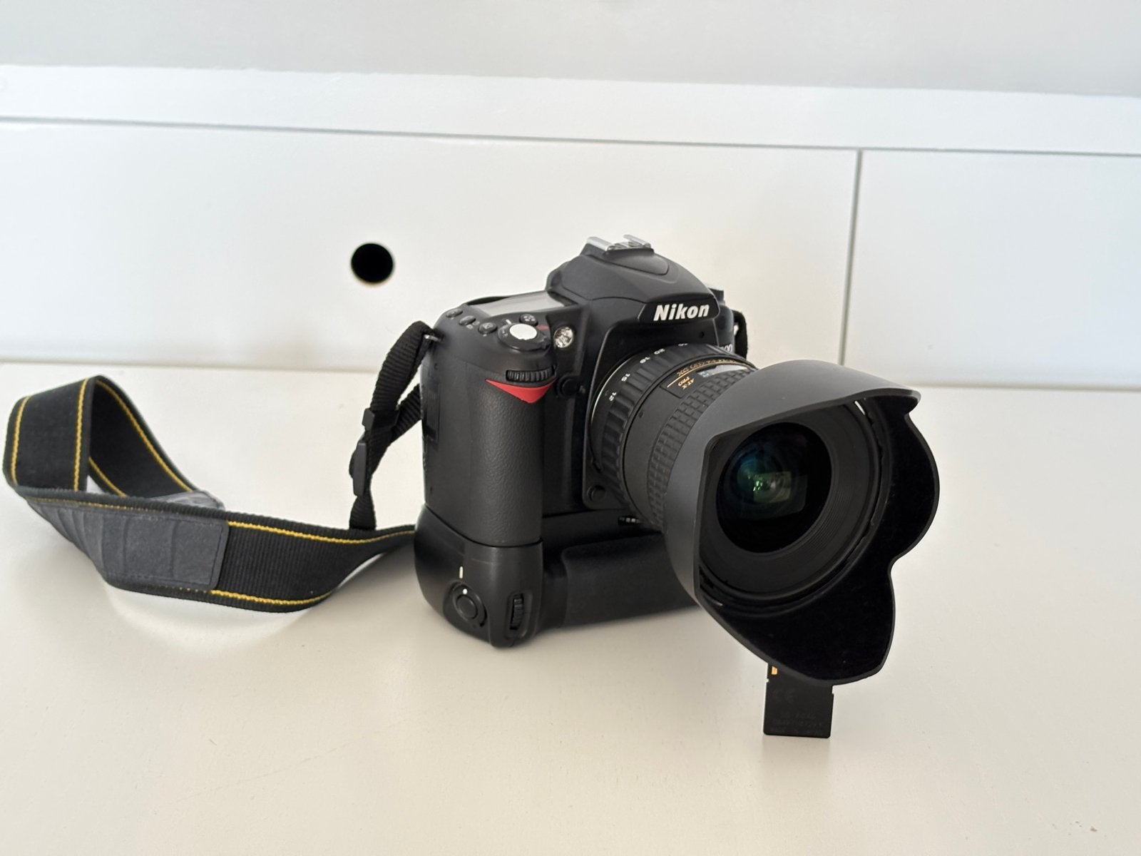 Nikon D90 spiegelreflexcamera met Tokina 12-24mm lens, Ingebouwde flitser, Gebruikt, Spiegelreflex, Ophalen of Verzenden