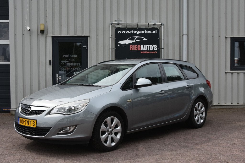Opel Astra Sports Tourer 1.4 Turbo Edition AUTOMAAT! nieuwe, Auto's, Opel, Euro 5, 15 km/l, Gebruikt, 4 cilinders