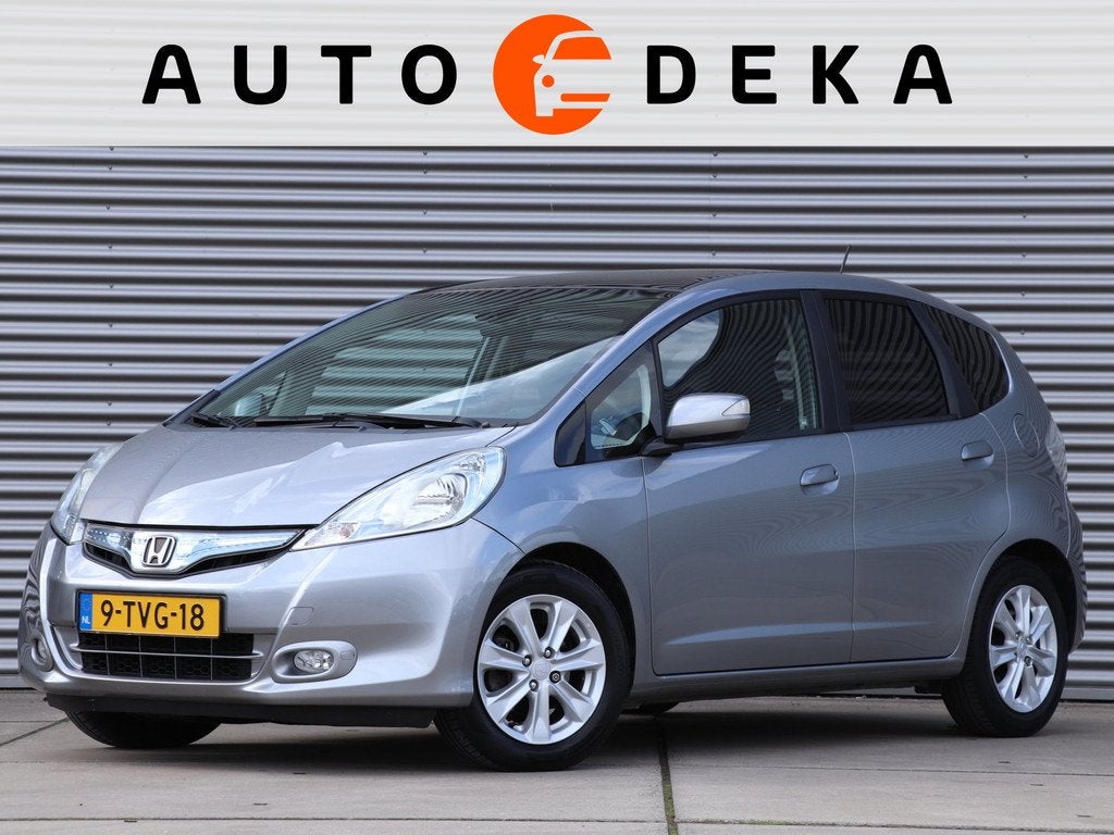 Honda Jazz 1.4 Hybrid Elegance *Dealeronderh.*Panodak*Cruise, Auto's, Euro 5, Stof, Gebruikt, Zwart
