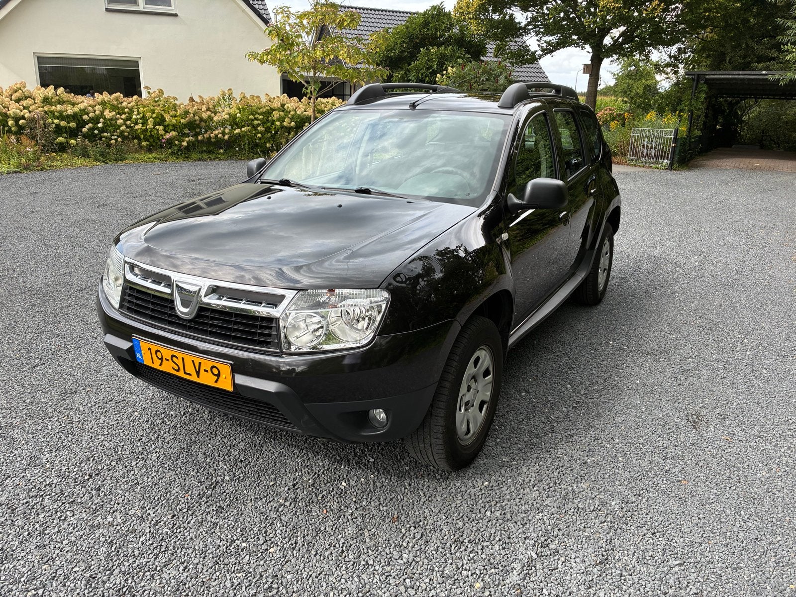 Dacia Duster 1.6 16V 74KW 2011 Zwart, Voorwielaandrijving, Stof, Zwart, 4 cilinders