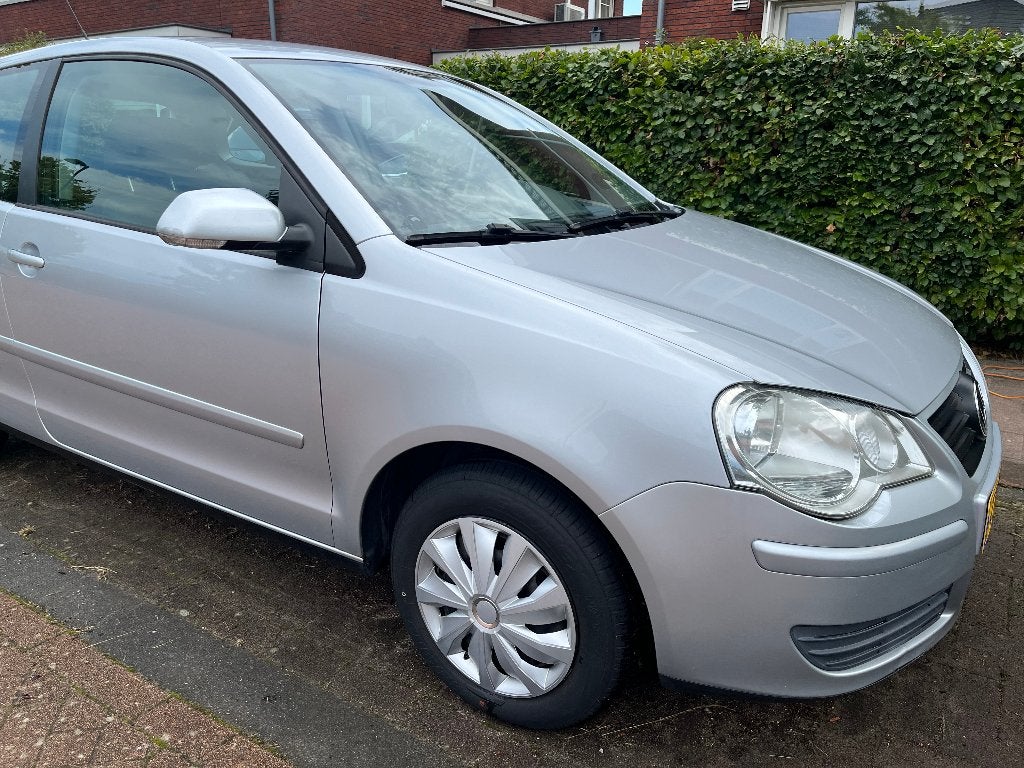 Volkswagen Polo 1.4 55KW AUT 2006 Grijs, Auto's, Stof, 74 pk, 4 cilinders, Origineel Nederlands
