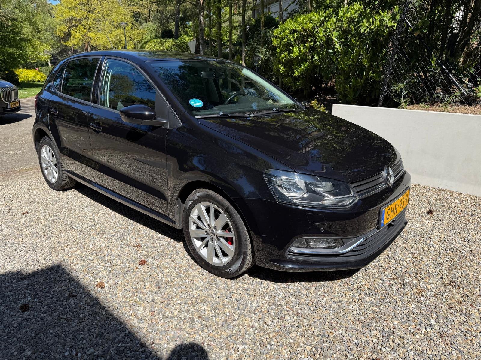 Volkswagen Polo 1.2 TSI 66KW 2015 Zwart, Auto's, 4 cilinders, Zwart, Handgeschakeld, Particulier