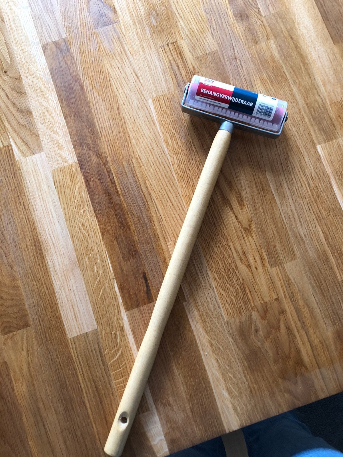 Behang roller., Ophalen