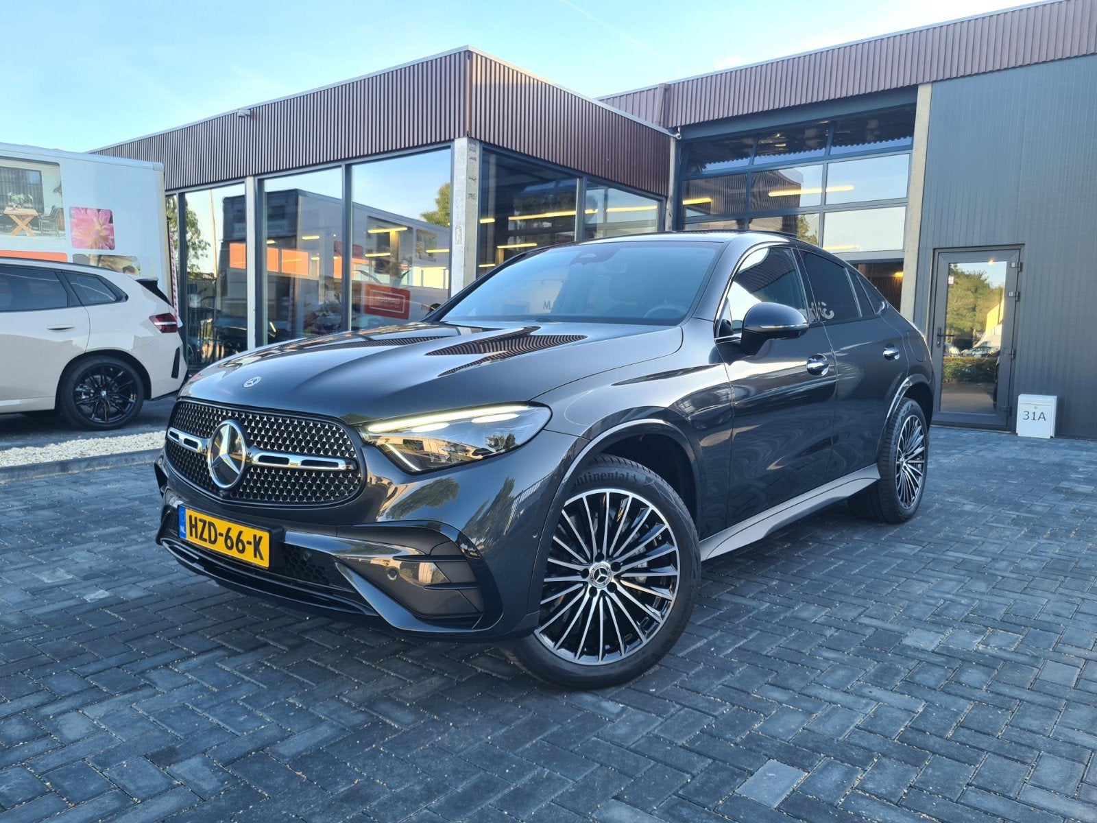 Mercedes-Benz GLC Coupé 300 e 313pk 4MATIC 2025 AMG Pack NL, Auto's, Automaat, 4 cilinders, 167 km/l, Bedrijf