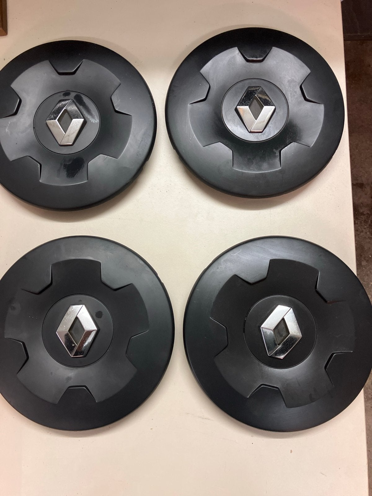 Set van 4 Renault wieldoppen, Ophalen of Verzenden, Zo goed als nieuw