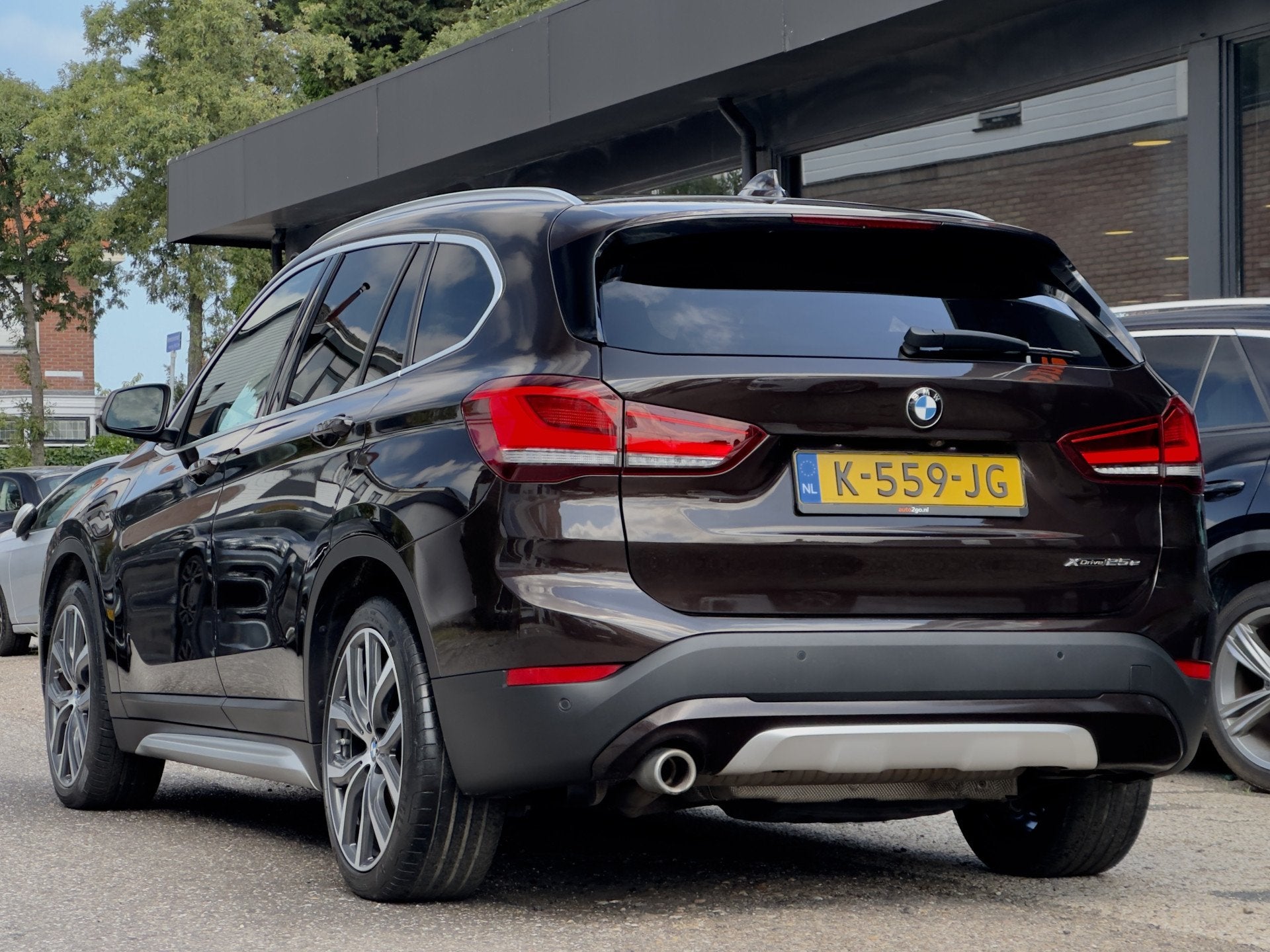 BMW X1 xDrive25e AUT6 EDITION. SPORTLEDER NAVI CAMERA APPLE-, Auto's, Gebruikt, 95 pk, Bruin, Automatische klimaatregeling