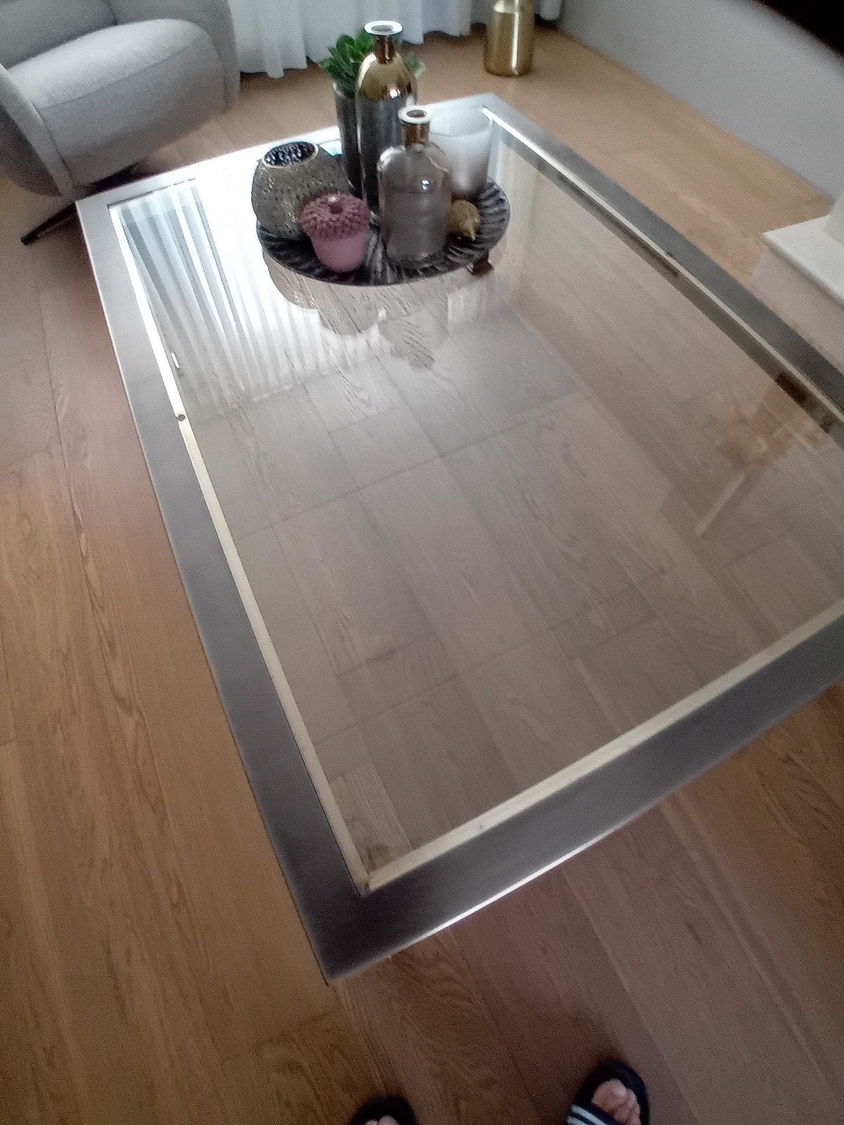Glazen salontafel met bronskleurig onderstel, Ophalen of Verzenden, Zo goed als nieuw, Rechthoekig, Glas