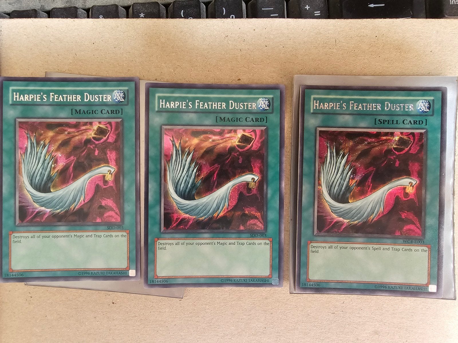 Harpie's Feather Duster Yu-Gi-Oh! Kaart (3 stuks), Hobby en Vrije tijd, Verzenden, Zo goed als nieuw, Meerdere kaarten, Foil