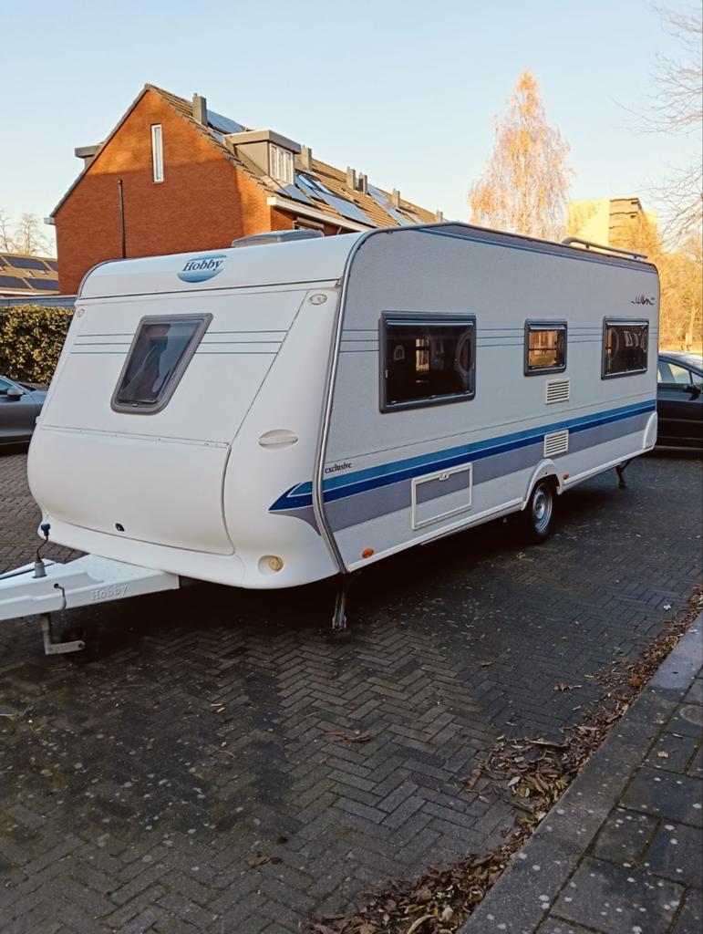 Hobby 560UFE 2005 exclusive, zeer compleet. 3de eigenaar, Caravans en Kamperen, Rondzit, Hobby, Frans bed, Particulier