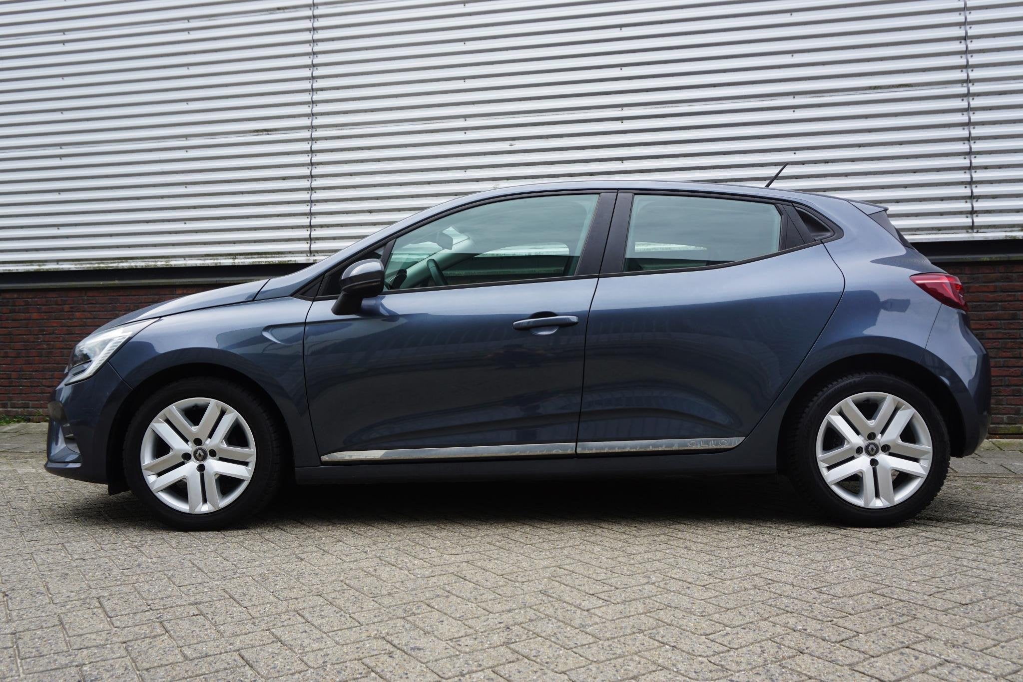 Renault Clio 1.0 TCe 100PK Zen/Navi/PDC/AppleCarPlay/ Rijkla, Auto's, Voorwielaandrijving, Gebruikt, Euro 6, 580 kg