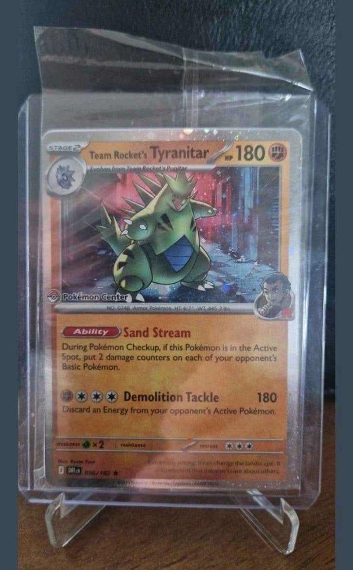 Team Rocket's Tyranitar (096/182) Pokemon Center Stamped, Ophalen of Verzenden, Zo goed als nieuw, Losse kaart
