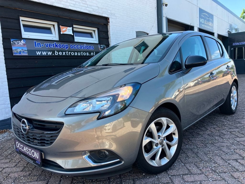 Opel Corsa E 1.4 COLOR EDITION zeer mooi AUDIO CRUISE PDC AL, Auto's, Voorwielaandrijving, Stof, Gebruikt, 23 km/l