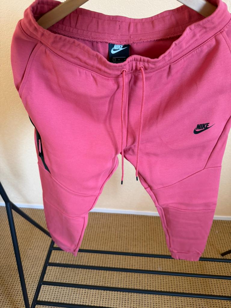 Nike tech trainingsbroek, Maat 52/54 (L), Fitness, Verzenden, Roze
