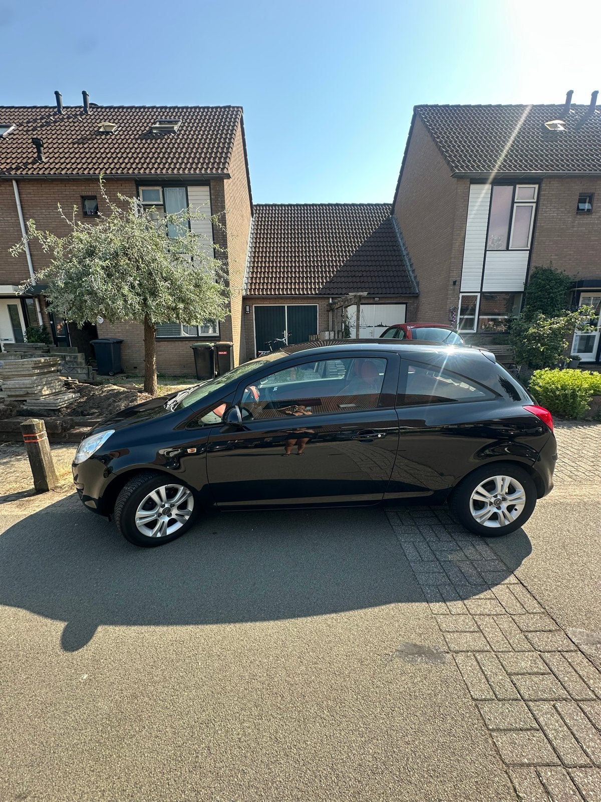 Opel Corsa 1.2 16V 3D WR 2008 Zwart, Auto's, Voorwielaandrijving, 450 kg, 40 €/maand, 1229 cc