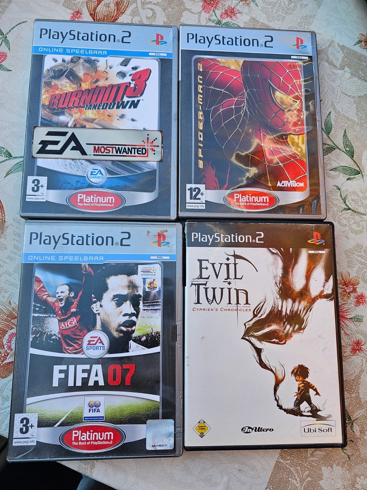 Partij PS2 games: Burnout 3,Spider-Man 2, FIFA 07, Evil Twin, Gebruikt, 1 speler, Racen en Vliegen, Ophalen of Verzenden