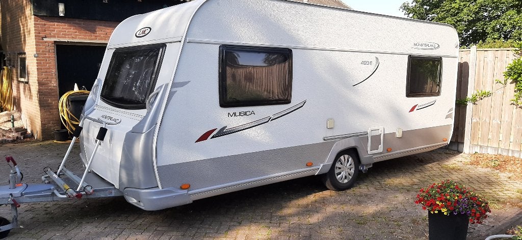 LMC Münsterland Musica 490E (bj. 2011), Caravans en Kamperen, Caravans, Schokbreker, Rondzit, Particulier, 2 aparte bedden