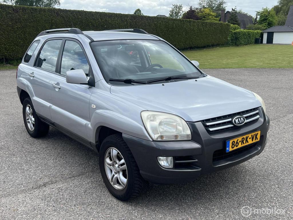 Kia Sportage 2.0 CVVT Executive, Auto's, Kia, Gebruikt, 4 cilinders, Automatische klimaatregeling, Leder en Stof