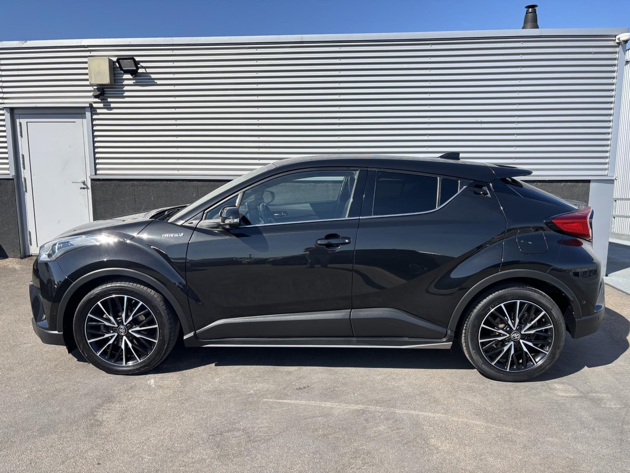 Toyota C-HR 1.8 Hybrid Executive Automaat Stoelverwarming, N, Auto's, Dealer onderhouden, Euro 6, 4 cilinders, Leder en Stof