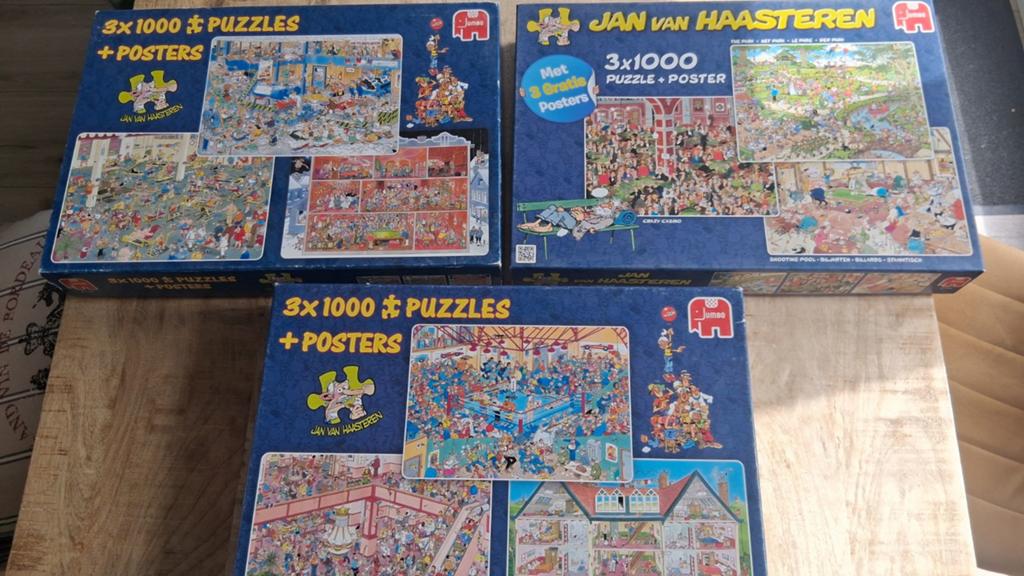 3 Jan van Haasteren puzzels van 3x1000 stukjes. €20 per doos, Ophalen of Verzenden, 500 t/m 1500 stukjes, Gebruikt, Legpuzzel