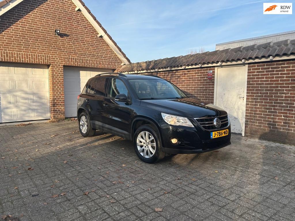 Volkswagen Tiguan 1.4 TSI Comfort&Design Gereviseerde motor, Auto's, Volkswagen, Voorwielaandrijving, Euro 5, Zwart, 4 cilinders