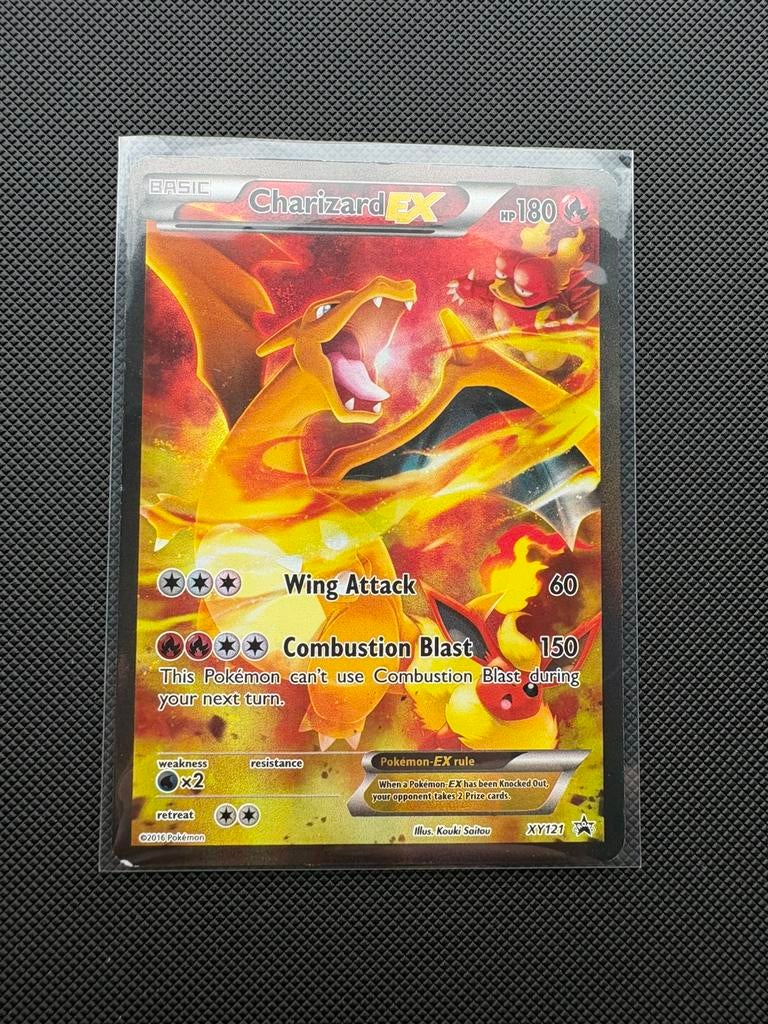 Charizard EX XY121 Black Star Promo, Ophalen of Verzenden, Zo goed als nieuw, Losse kaart