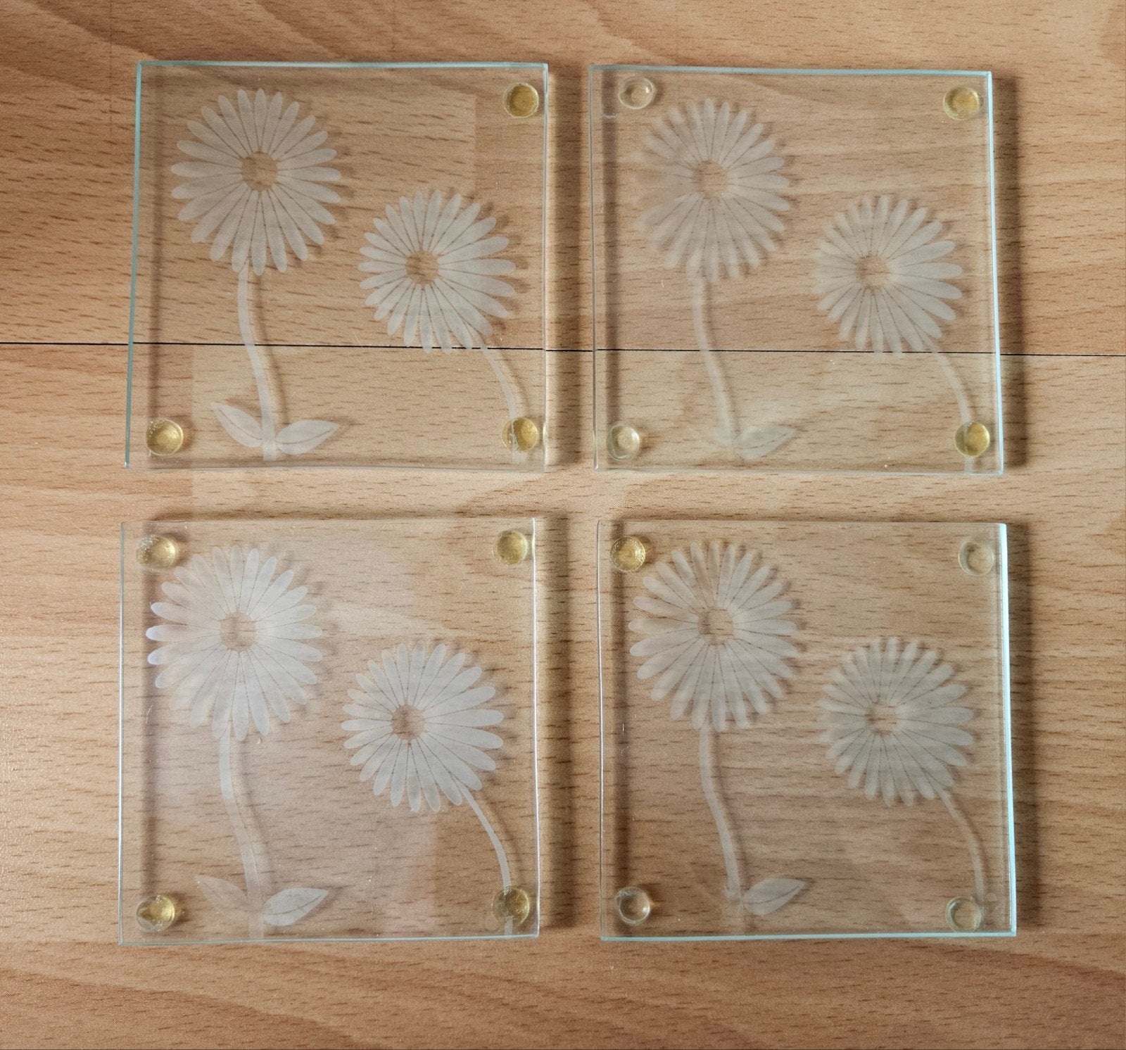 Glazen onderzetters met afbeelding van bloemen, Ophalen of Verzenden, Gebruikt, Glas of Kopje