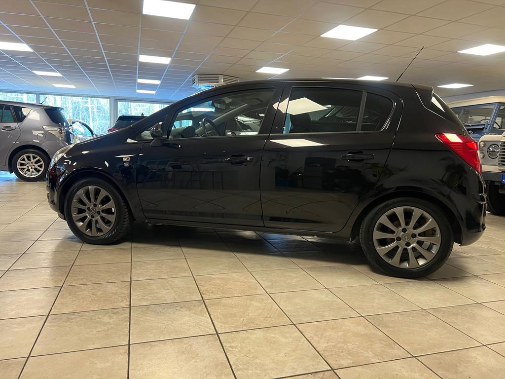 Opel Corsa 1.2-16V '111' Edition Airco, Cruise controle. Lic, Auto's, Voorwielaandrijving, Euro 5, Gebruikt, Zwart