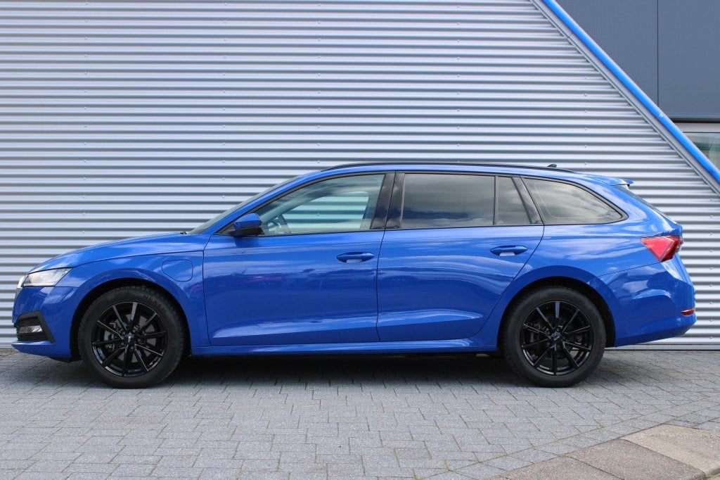 Skoda Octavia Combi 1.4 TSI iV PHEV Business Editon | PDC |, Auto's, Automaat, Stof, Gebruikt, 4 cilinders