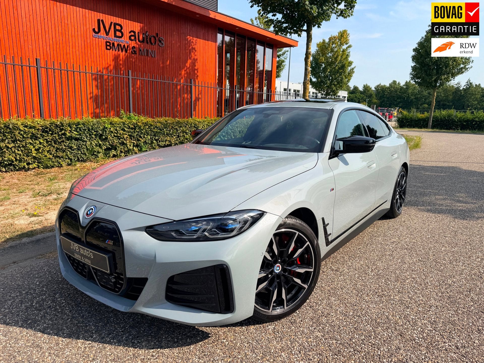BMW I4 M50 M-sport, M-stoel memory, schuifdak, H&K, Auto's, BMW, 12 maanden, Gebruikt, Zwart, 4 stoelen