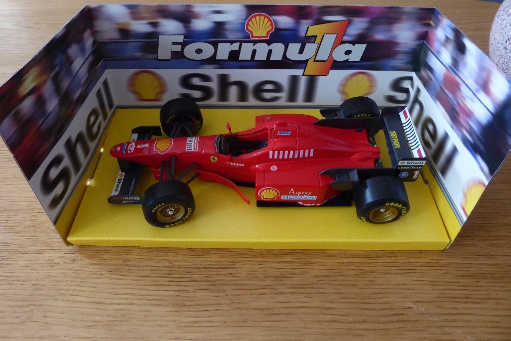 Formule 1 - Ferrari  (schaal 1:24 uitgegeven door Shell), Verzamelen, Ophalen of Verzenden, Zo goed als nieuw, Formule 1
