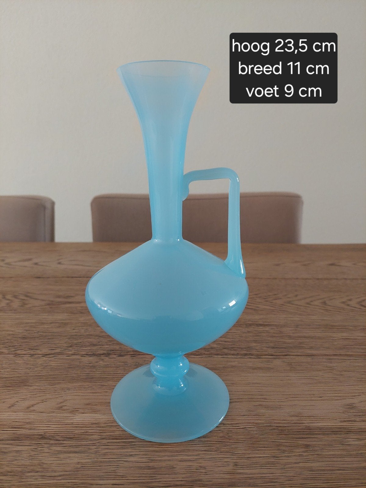 Opaline blauwe vaas, Ophalen