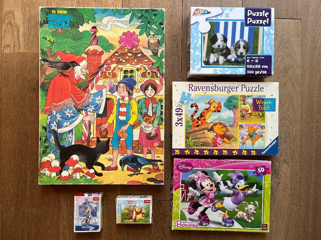 8 kinderpuzzels (Winnie de Poeh, Hans en Grietje, Puppies), Ophalen, Meer dan 50 stukjes, Gebruikt, 6 jaar of ouder