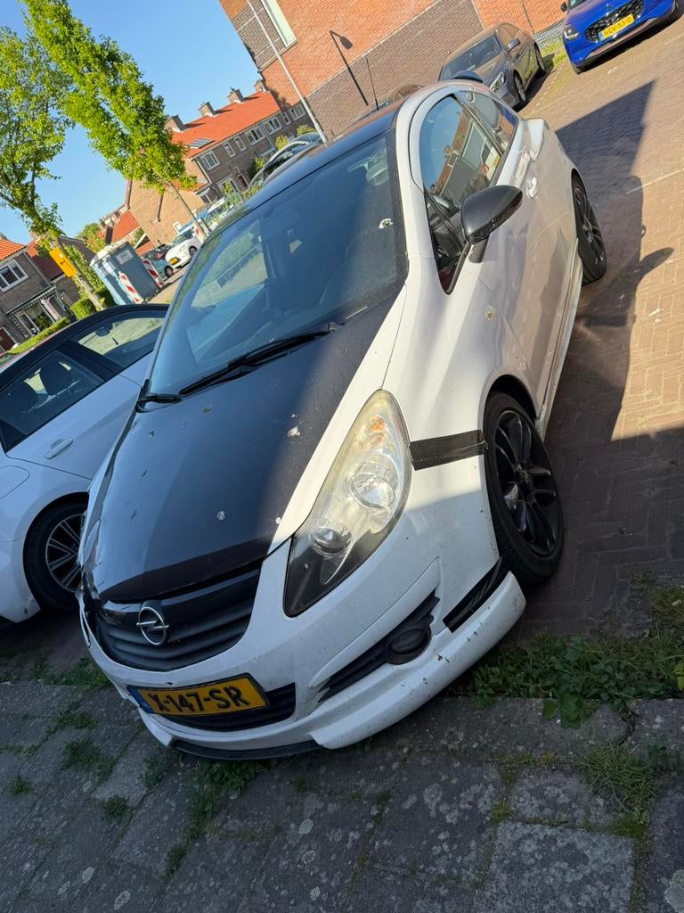 Opel Corsa 1.4 64KW 3D 2010 Wit, Auto's, Opel, Voorwielaandrijving, 40 €/maand, 4 cilinders, Wit