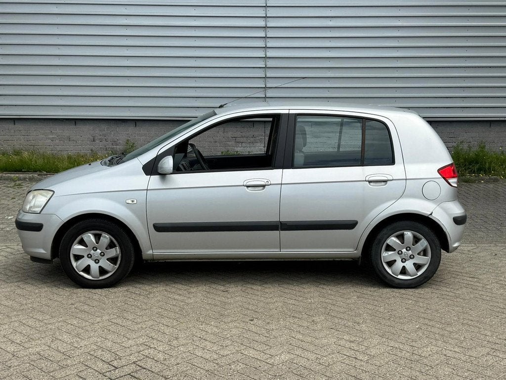 Hyundai Getz 1.3i Dynamic Automaat (CRUISE), Auto's, Hyundai, Zwart, 4 cilinders, Bedrijf, Getz