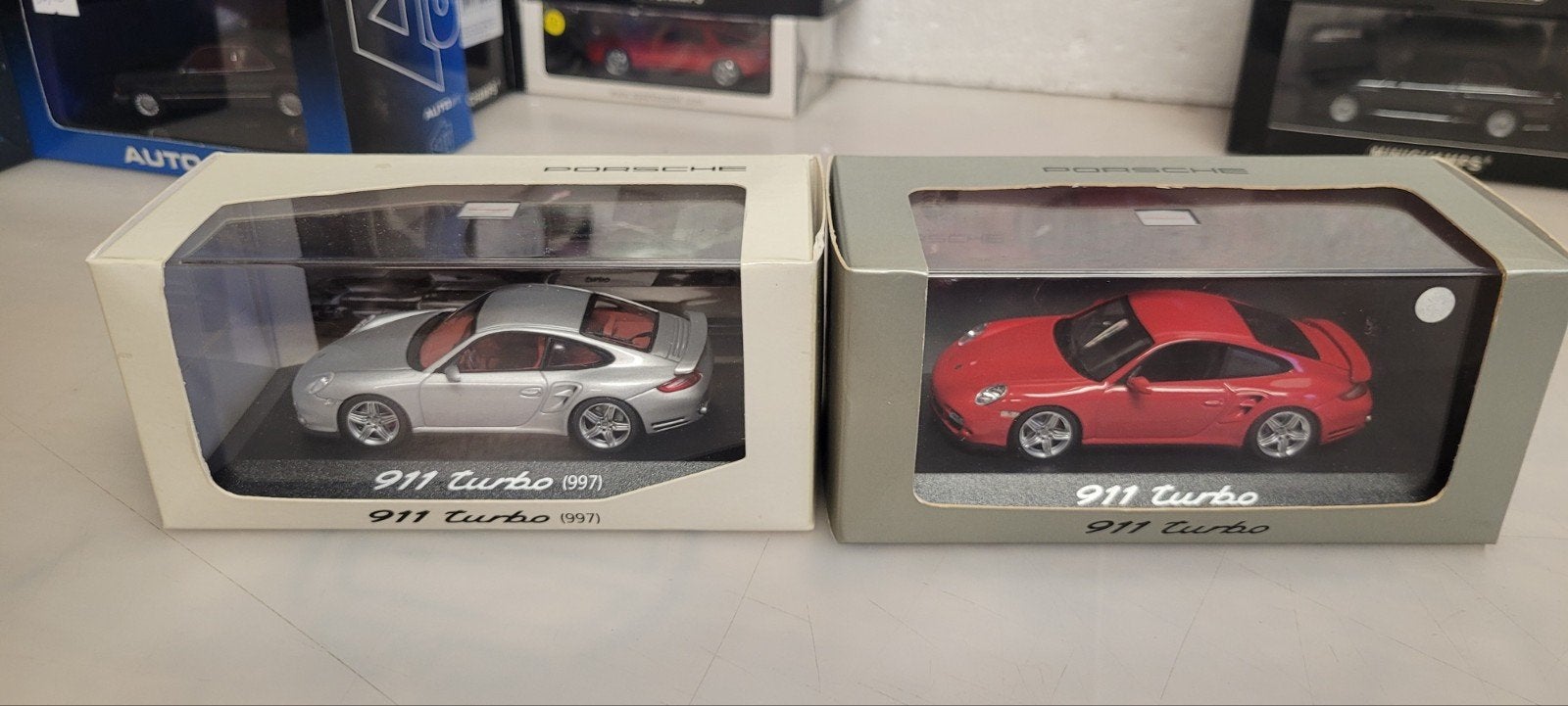 Minichamps Porsche 911 997 Turbo  zilver &rood, Hobby en Vrije tijd, Modelauto's | 1:43, Ophalen of Verzenden, Zo goed als nieuw