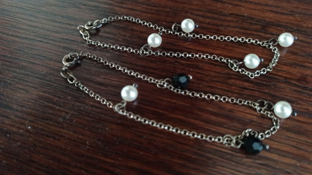 2x armbandjes, Staal, Ophalen of Verzenden, Zo goed als nieuw, Met edelsteen