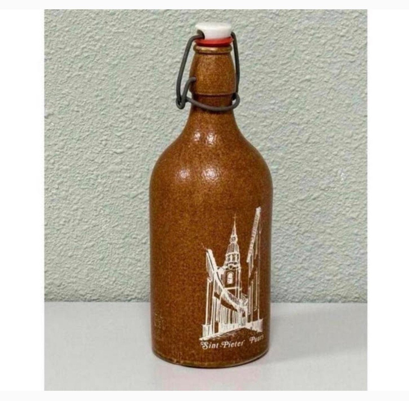 Stenen kruik beugel Sint Pieter Puurs stoneware bier fles, Ophalen of Verzenden, Zo goed als nieuw, Flesje(s), Overige merken