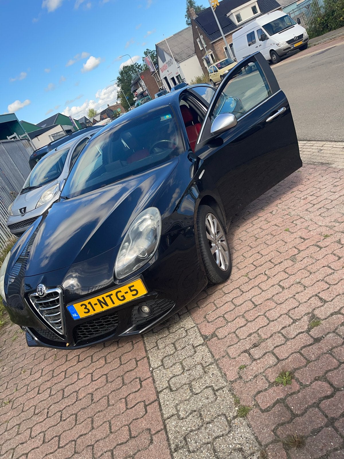 Alfa Romeo Giulietta 1.4 Turbo Multi AIR 2010 Zwart, Auto's, Voorwielaandrijving, 4 cilinders, Zwart, Origineel Nederlands