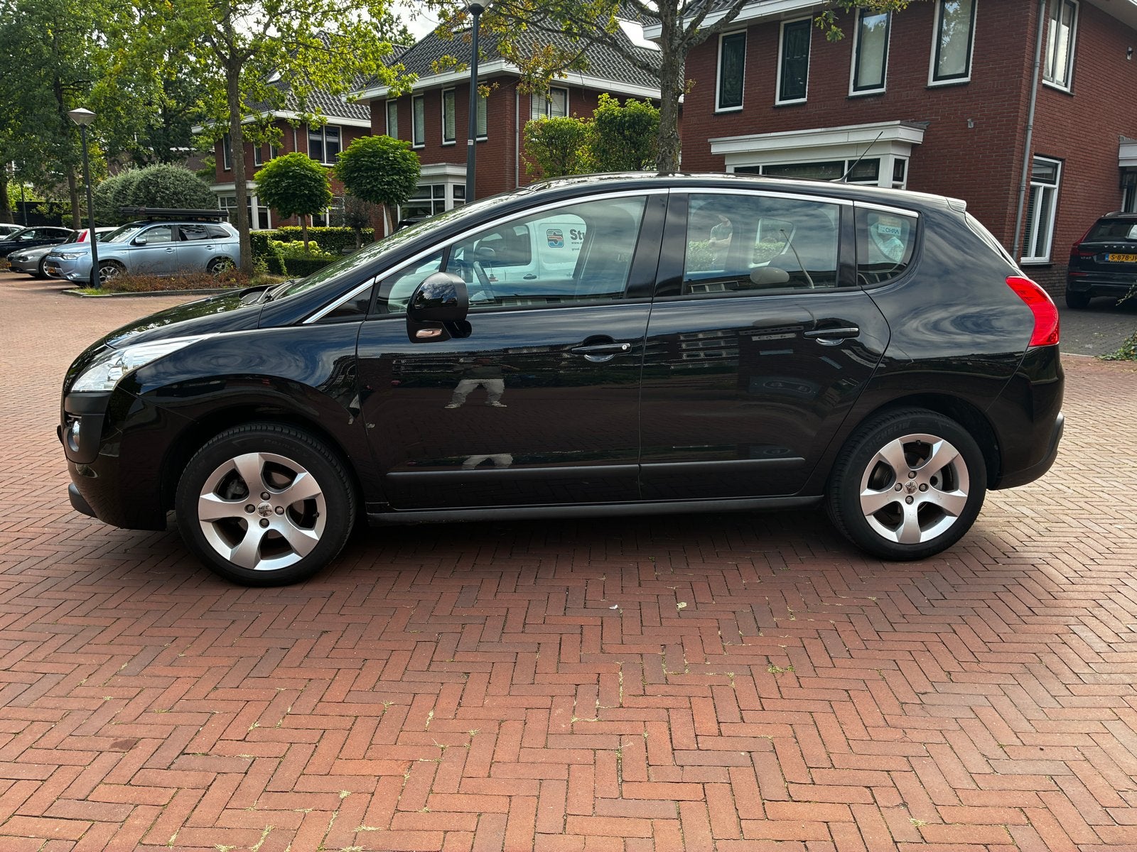 Peugeot 3008 1.6 VTI 2009 | 66.489km | 1e eigenaar, Voorwielaandrijving, Stof, Zwart, 4 cilinders