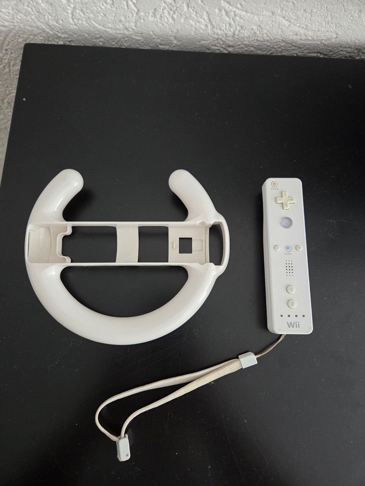 Defecte Wii controller met stuur, Spelcomputers en Games, Ophalen of Verzenden, Niet werkend, Zonder controller, Met stuurtje