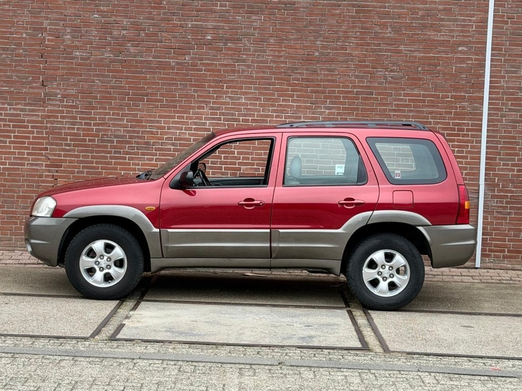 Mazda Tribute 3.0 V6 Touring 4WD |AUTOMAAT |AIRCO |NWE APK, Auto's, Automaat, Leder, Bedrijf, 2967 cc