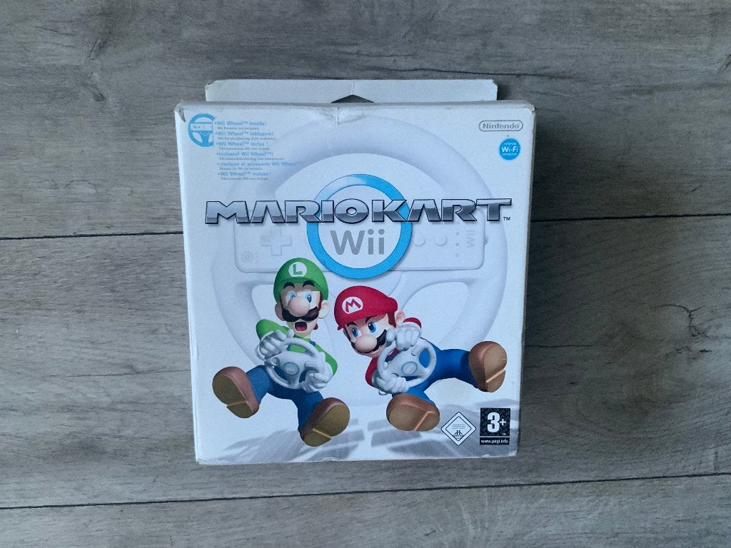 Super Mario Kart + Wheel / Stuurtje in doos Nintendo Wii, Racen en Vliegen, Ophalen of Verzenden, Zo goed als nieuw, 3 spelers of meer