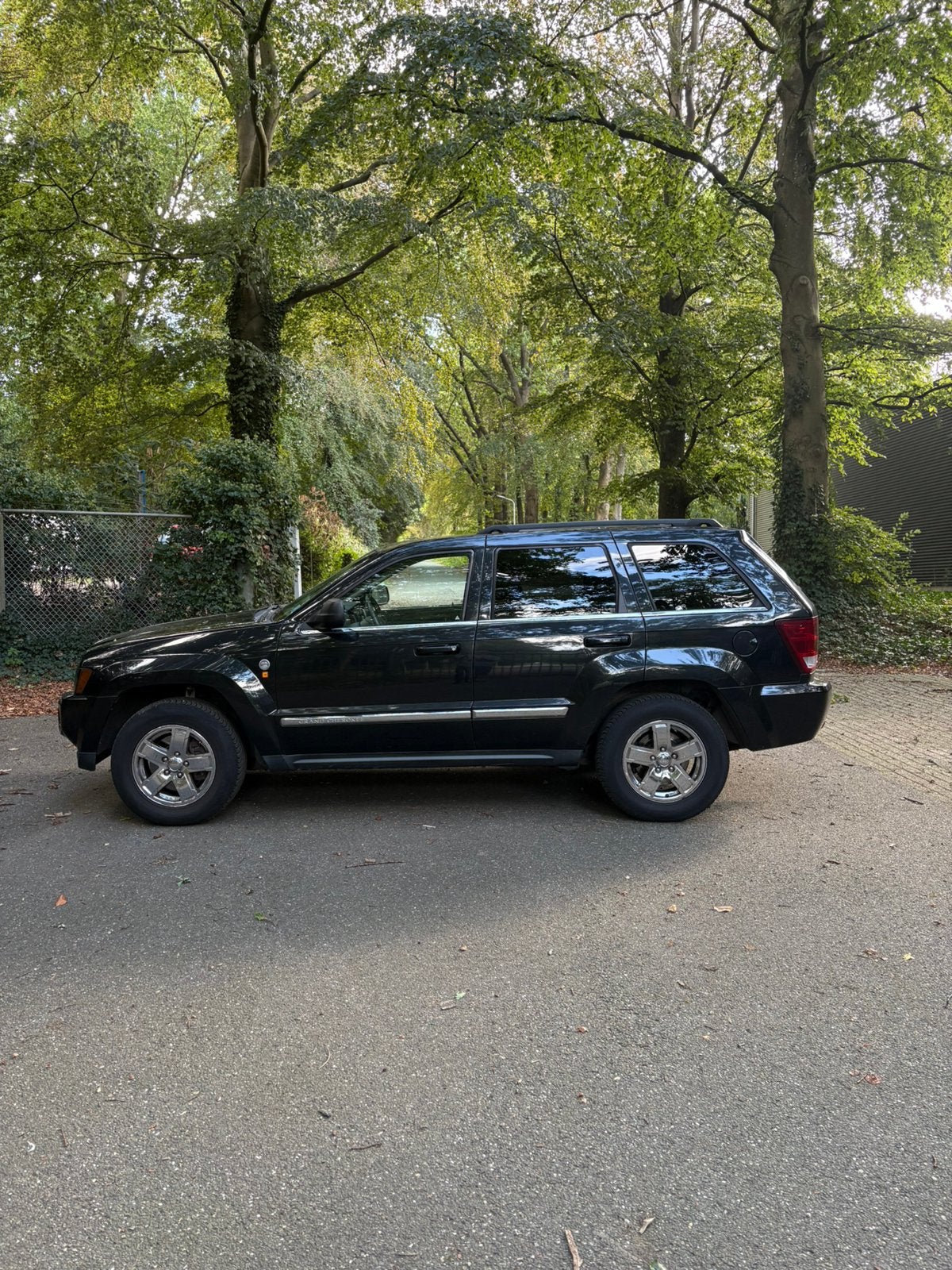 Jeep Grand Cherokee 2005 Zwart, Auto's, 8 cilinders, 5654 cc, 138 €/maand, Zwart