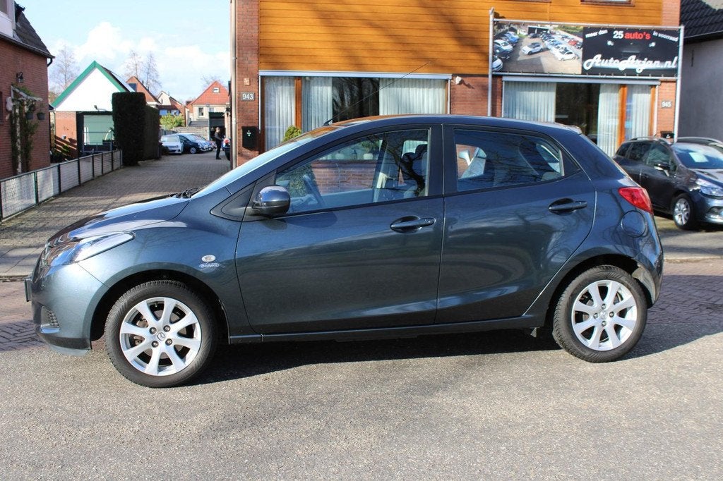 Mazda 2 1.3 TS Airco, Nwe APK, Garantie, Auto's, Mazda, Voorwielaandrijving, Stof, Gebruikt, Zwart