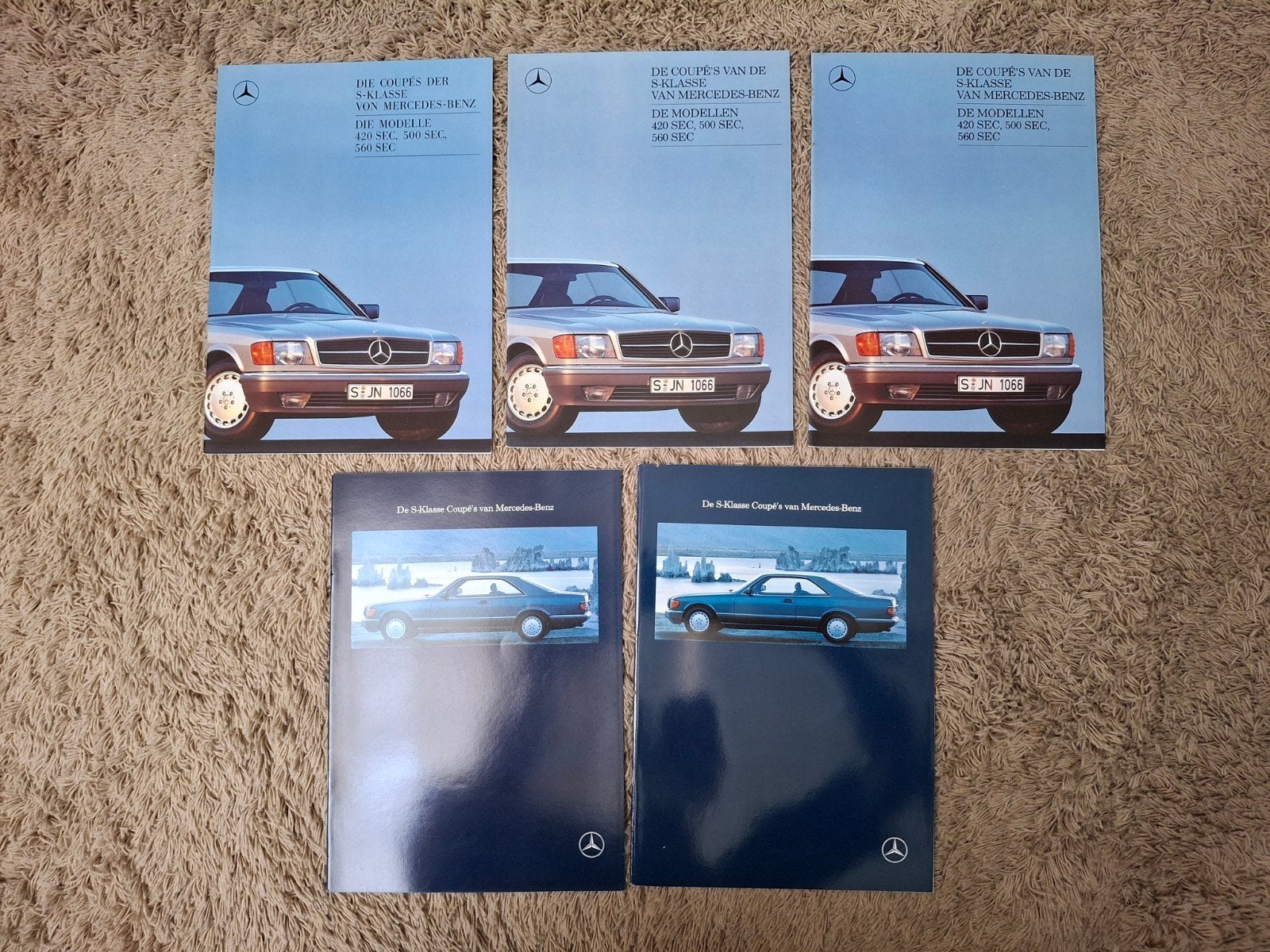 Lot autofolders Mercedes S-klasse coupe W126, Verzenden, Zo goed als nieuw, Mercedes