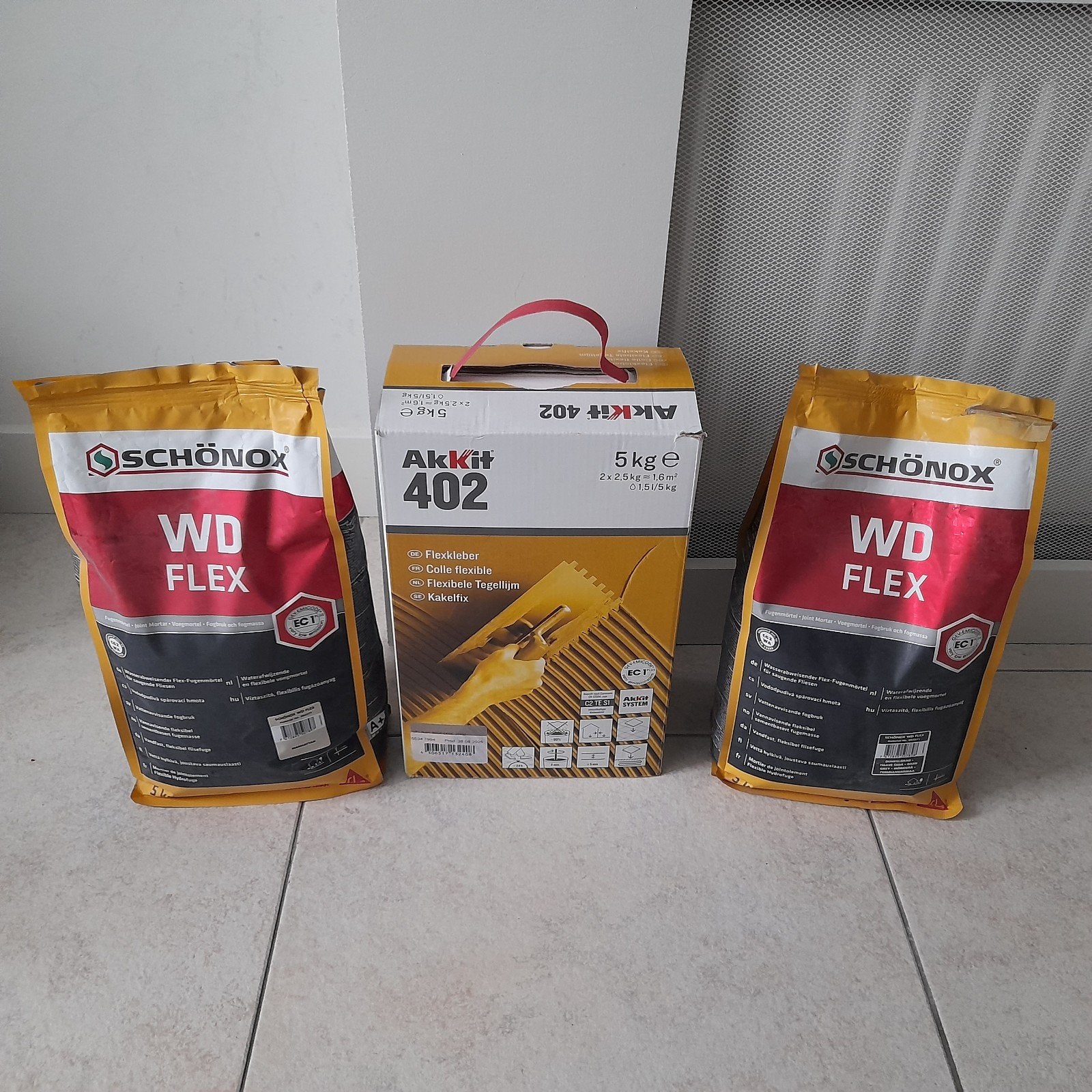 Tegellijm Akkit 402 & Schönox WD Flex voegmortel, Doe-het-zelf en Verbouw, Tegels, Ophalen