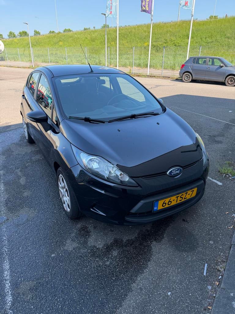 Ford Fiësta 1.25 44KW 5DR 2012 Zwart, Voorwielaandrijving, Euro 5, Stof, 40 €/maand